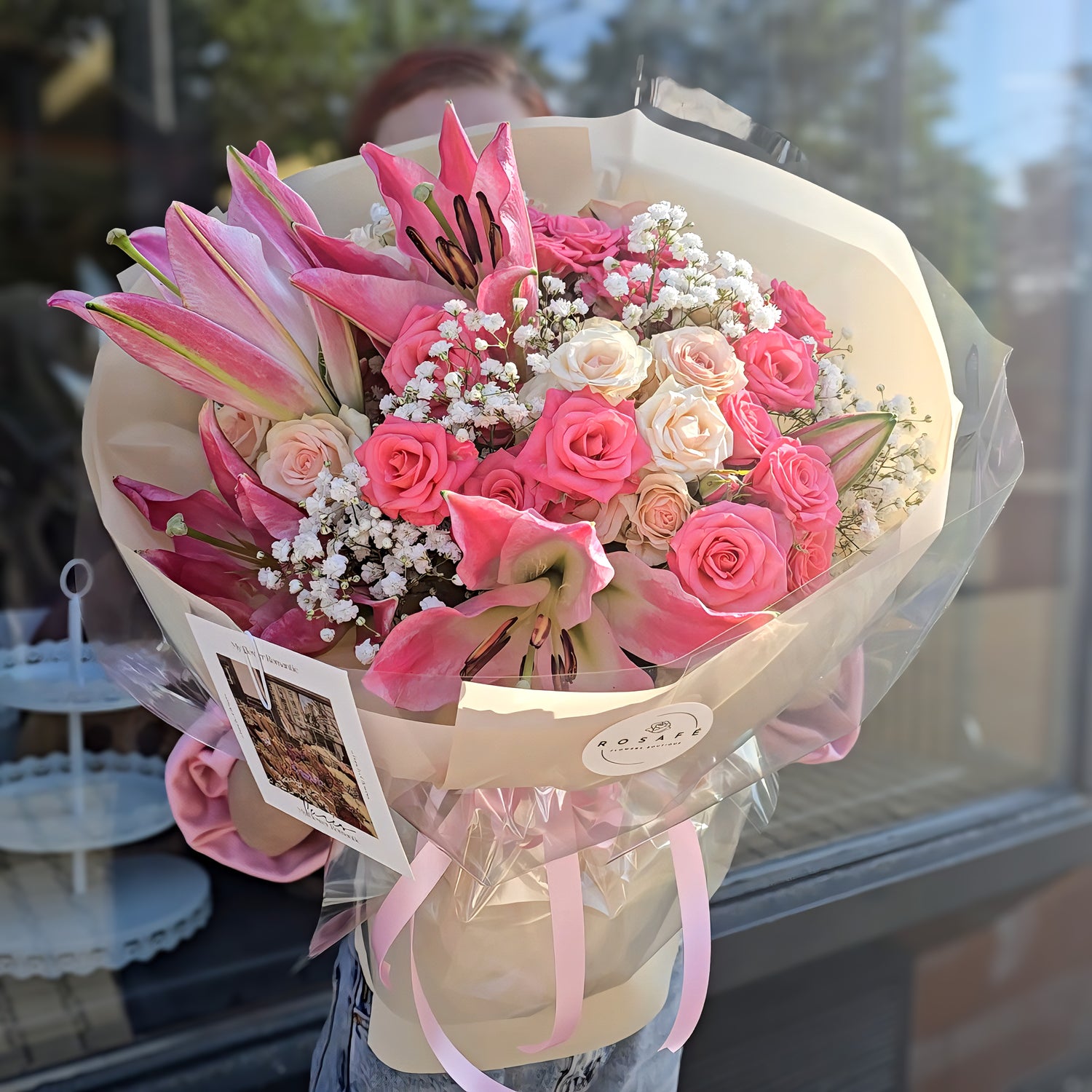 Luxurious bouquet with pink lilies and roses - the perfect gift of love