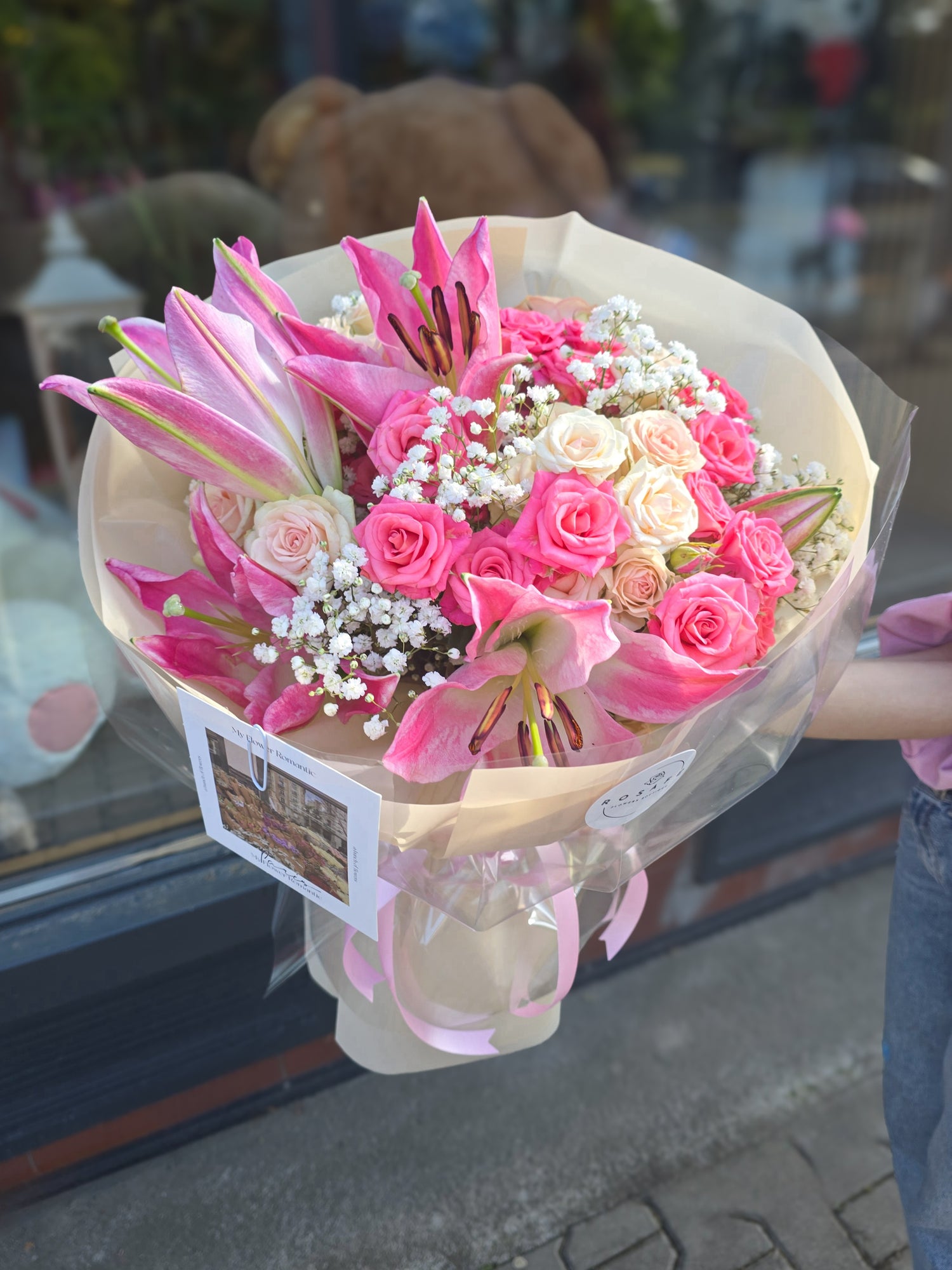 Luxurious bouquet with pink lilies and roses - the perfect gift of love