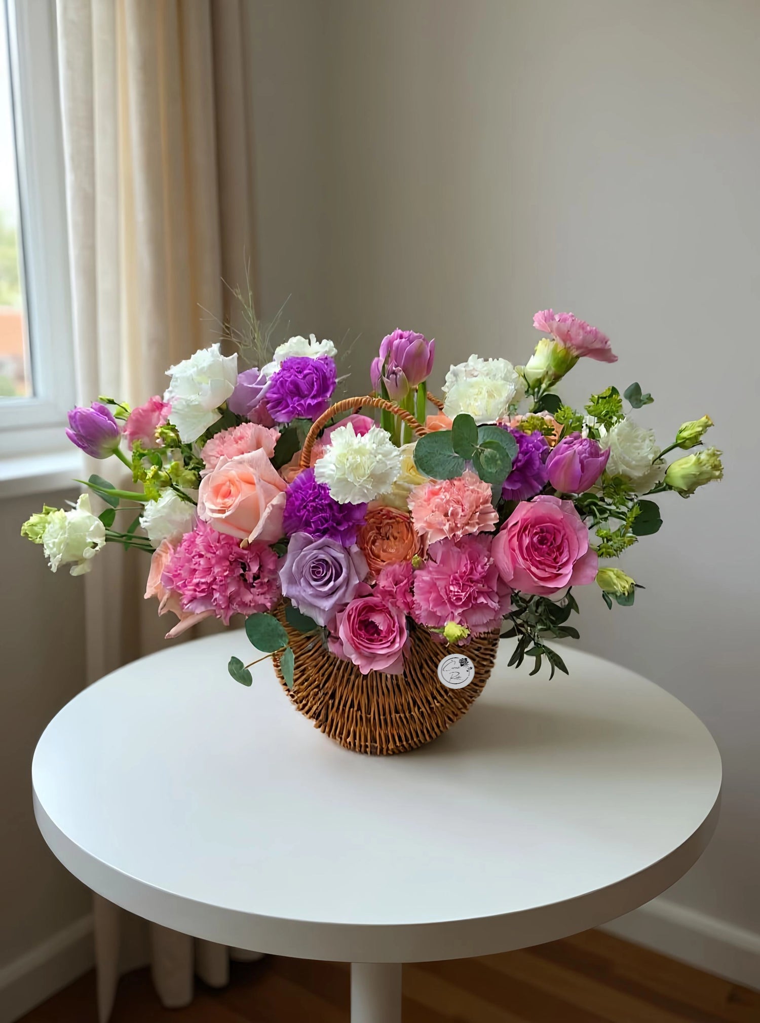 Spring flower basket in pastel tones